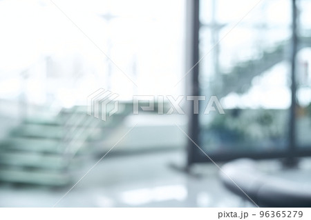 blurry image of a staircase in an office building . 96365279