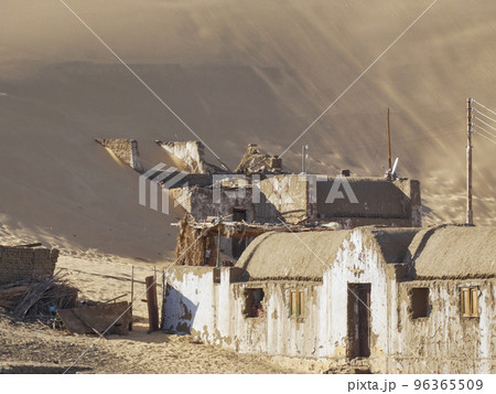 house buried in the desert between the dunes house buried in the desert between the dunes 96365509