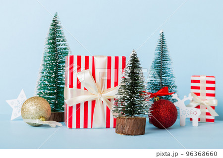 Christmas composition. craft Gift box, small tree, branches and craft DIY decorations on white background. New year concept. Christmas home decoration Flat lay, top view, copy space 96368660