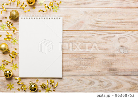 Christmas blank greeting card mock-up scene. Creative layout made of Christmas tree branches and paper card note. Flat lay. Nature New Year concept 96368752