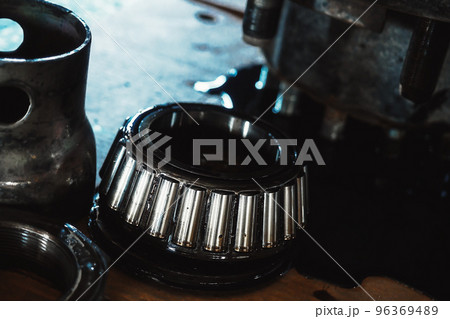 Lubricated roller bearing. Truck suspension repair part. Close-up. Background. Lubricated roller bearing. Truck suspension repair part. Close-up. Background. 96369489