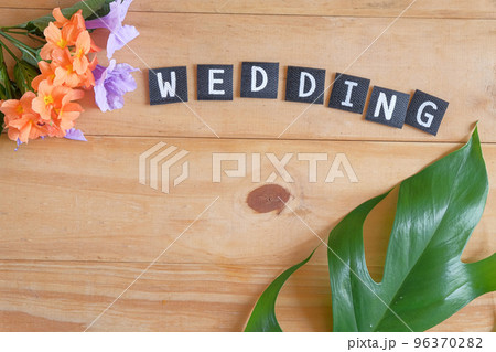 Wedding text on wood table , love concept. Wedding text on wood table , love concept. 96370282