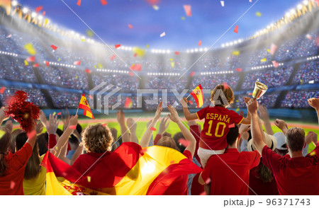 Spain football team supporter on stadium. Spain football team supporter on stadium. 96371743