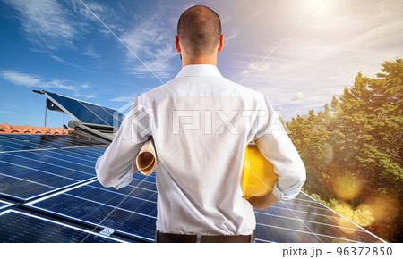 Architect follows the project of photovoltaic panels Architect follows the project of photovoltaic panels 96372850