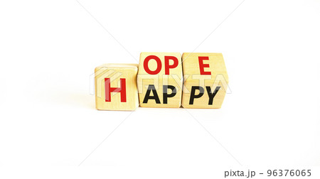 Hope and happy symbol. Concept words Hope and Happy on wooden cubes. Beautiful white table white background. Business hope and happy concept. Copy space. Hope and happy symbol. Concept words Hope and Happy on wooden cubes. Beautiful white table white background. Business hope and happy concept. Copy space. 96376065