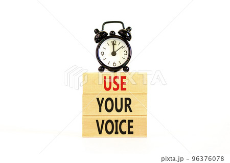 Use your voice symbol. Concept words Use your voice on wooden blocks on a beautiful white table white background. Black alarm clock. Business and use your voice concept. Copy space. Use your voice symbol. Concept words Use your voice on wooden blocks on a beautiful white table white background. Black alarm clock. Business and use your voice concept. Copy space. 96376078