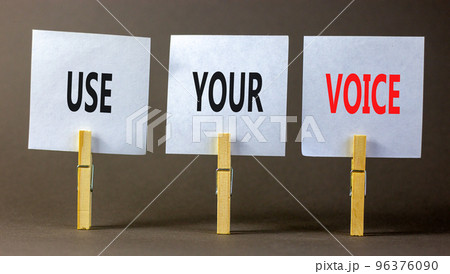 Use your voice symbol. Concept words Use your voice on white paper on a beautiful grey table grey background. Business and use your voice concept. Copy space. Use your voice symbol. Concept words Use your voice on white paper on a beautiful grey table grey background. Business and use your voice concept. Copy space. 96376090