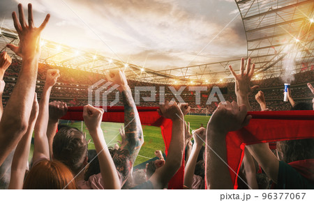 Football scene with cheering audience at the stadium Football scene with cheering audience at the stadium 96377067