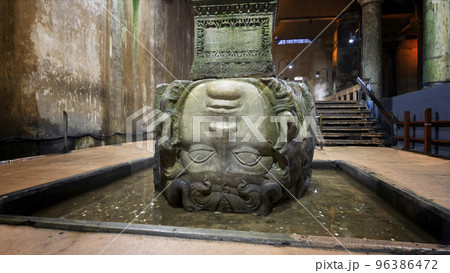 Head of the Medusa Gorgon in the underground tank Basilica, Istanbul, Turkey 96386472