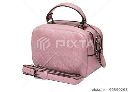 Small pink women's bag with two zippers, with a handle and a clip-on strap, on a white background Small pink women's bag with two zippers, with a handle and a clip-on strap, on a white background 96390268