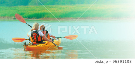 The Kayaking and canoeing with family. The Kayaking and canoeing with family. 96391108