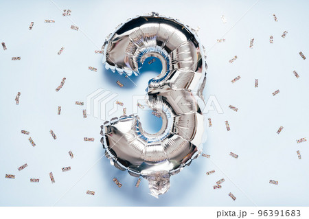Silber balloon number 3 on light glitter background 96391683