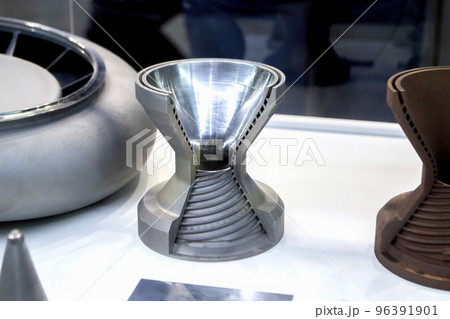 Object printed on 3D printer for metal. Close-up view of model printed from metal powder on 3D printer. New modern accurate additive technologies. Modeling 3D printing technology Object printed on 3D printer for metal. Close-up view of model printed from metal powder on 3D printer. New modern accurate additive technologies. Modeling 3D printing technology 96391901