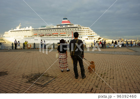 People sees off a cruise ship. Cruise ship Asuka II at sunset 96392460