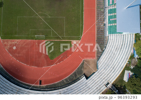 Aerial view of empty soccer field from above with running tracks around it Amazing stadium for many sport disciplines at phuket thailand Aerial view of empty soccer field from above with running tracks around it Amazing stadium for many sport disciplines at phuket thailand 96393293