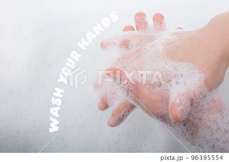 Child washing hands in foam Stop COVID-19. Child washing hands in foam Stop COVID-19. 96395554