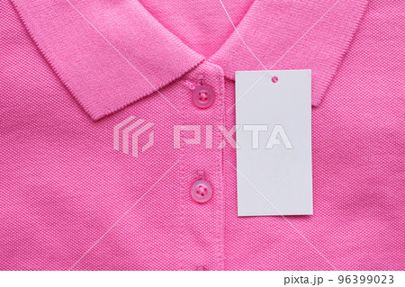 Blank white clothes tag label on new shirt 96399023