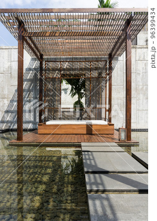 slats roof, architecture construction with sunlight streaming through making beautiful shadow lines. slats roof, architecture construction with sunlight streaming through making beautiful shadow lines. 96399434