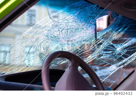 windshield of a car after a traffic accident. transport safety 96402432