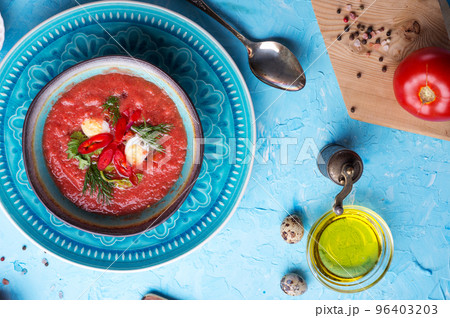 classic spanish raw eating cold soup Gazpacho served at blue  table. flat lay. food recipe. healthy concept. 96403203