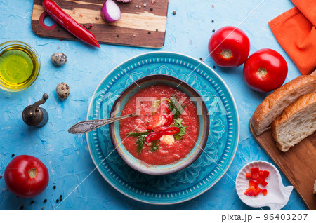 classic spanish raw eating cold soup Gazpacho served at blue  table. flat lay. food recipe. healthy concept. 96403207