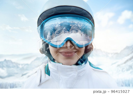 Woman At The Ski Resort On The Background Of Mountains And Blue Sky.A Mountain Range Reflected In The Ski Mask. Winter Sports. 96415027