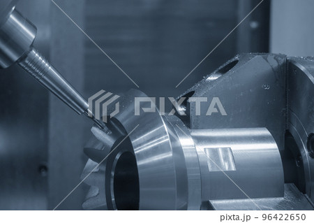 The 5-axis CNC milling machine  cutting the metal gear part. 96422650