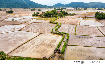Khmer pagoda between rice fields in An Giang, Vietnam Khmer pagoda between rice fields in An Giang, Vietnam 96423410