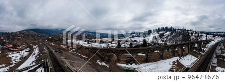 Viaduct railway bridge in the Carpathians of Ukraine, a view of the bridge from above. 96423676