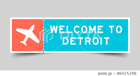 Orange and blue color ticket with plane icon and word welcome to detroit on gray background 96425296