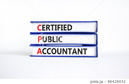 CPA certified public accountant symbol. Concept words CPA certified public accountant on books on a beautiful white background. Business and CPA certified public accountant concept. Copy space 96426032