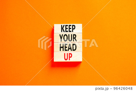 Keep your head up symbol. Concept words Keep your head up on wooden cubes. Beautiful white table white background. Business motivational keep your head up concept. Copy space. 96426048