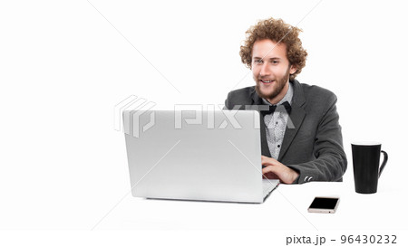 Portrait of funny businessman with bow tie who sitting and using laptop isolated on white background Portrait of funny businessman with bow tie who sitting and using laptop isolated on white background 96430232