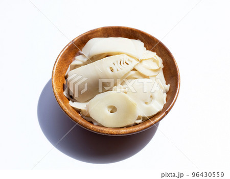 Preserved bamboo shoot slices on white background Preserved bamboo shoot slices on white background 96430559