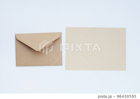 Brown paper and envelopes on white background. 96430595