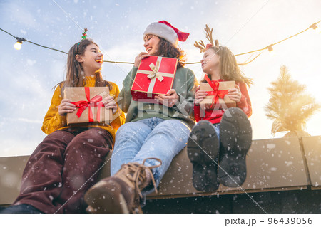 family preparing for Christmas family preparing for Christmas 96439056