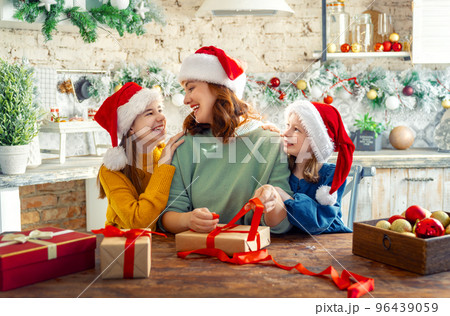 family preparing for Christmas family preparing for Christmas 96439059