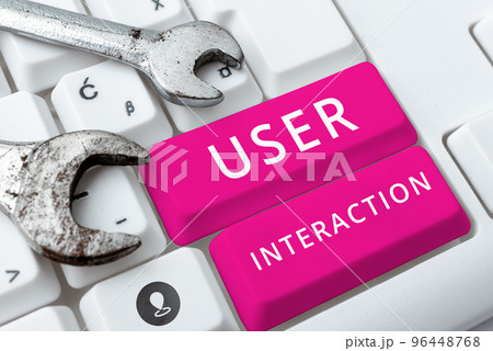 Text sign showing User Interaction. Word Written on how the customer acts on the system and vice versa Text sign showing User Interaction. Word Written on how the customer acts on the system and vice versa 96448768