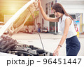 Woman the car is broken. 96451447