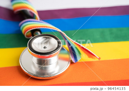 stethoscope on rainbow flag background, symbol of LGBT pride month  celebrate annual in June social, symbol of gay, lesbian, bisexual, transgender, human rights and peace. 96454135