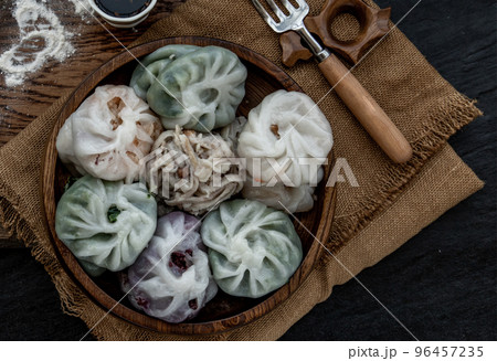 Chinese chives Dumplings Mixed Color or Garlic Chives Dim Sum Rice Cake inside with Taro Slice ,Bamboo shoot and Many kind of vegetable inside the flour, Steamed Served Sweet Black Soy Sauce Chinese Chinese chives Dumplings Mixed Color or Garlic Chives Dim Sum Rice Cake inside with Taro Slice ,Bamboo shoot and Many kind of vegetable inside the flour, Steamed Served Sweet Black Soy Sauce Chinese 96457235