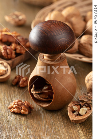 Walnuts on a wooden table. Walnuts on a wooden table. 96457314