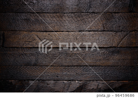 Dark stained wooden texture background 96459686