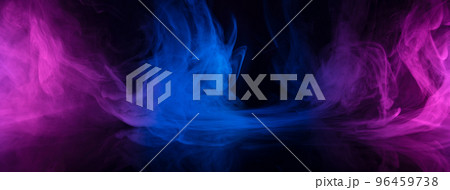 Multicolored smoke clouds in blue and pink neon light swirling on empty scene with reflection 96459738