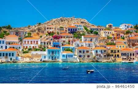 Colorful houses in picturesque small island Halki in Greece Colorful houses in picturesque small island Halki in Greece 96461450