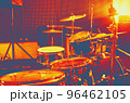 Warm vintage toned musical photo background, drummer plays. Thermography gradients, retro glitch, noise, selective focus 96462105