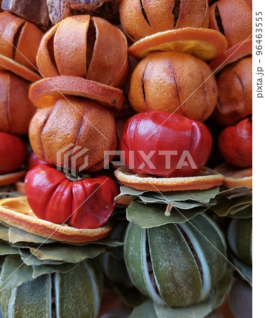 Christmas decoration made of fragrant dried strung fruits. Christmas decoration made of fragrant dried strung fruits. 96463555