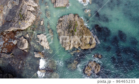 A lot of boulders in the sea. Coastal cliffs of the North Atlantic. Seaside beautiful nature. Dramatic seascape of the north of Europe. 96465235
