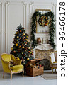 Christmas tree with presents underneath in living room 96466178
