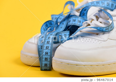 Morning run for health concept. Centimeter in cyan blue color Morning run for health concept. Centimeter in cyan blue color 96467014